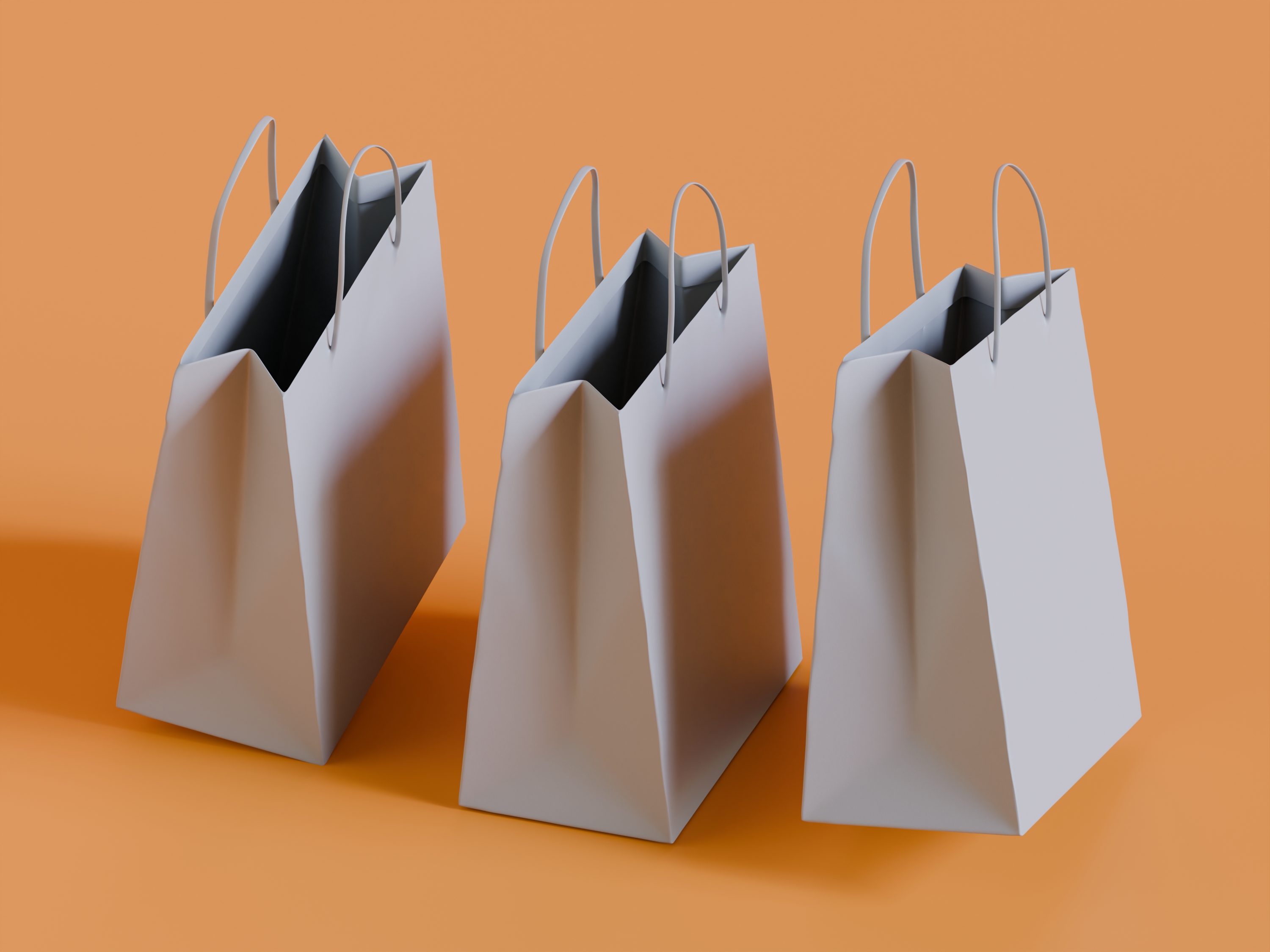 Group of flat-handle kraft paper bags in varied sizes.